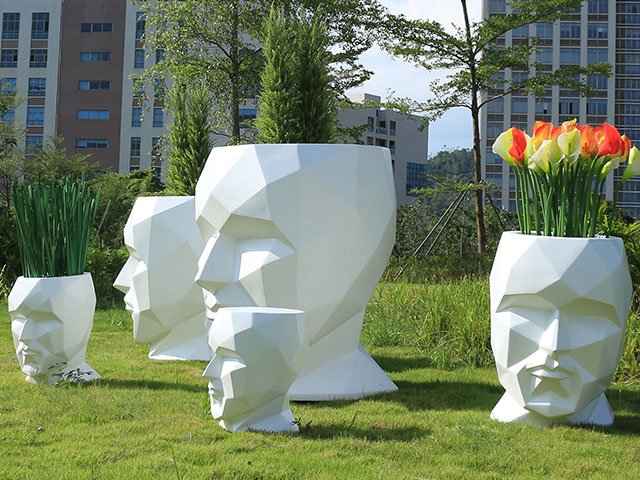 商場(chǎng)玻璃鋼人臉?biāo)囆g(shù)花盆