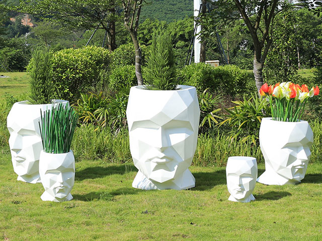 商場(chǎng)玻璃鋼人臉?biāo)囆g(shù)花盆